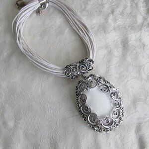 Vintage Designer JK Jewel Kade Ceramic Pendant In Silver Tone Scroll Frame